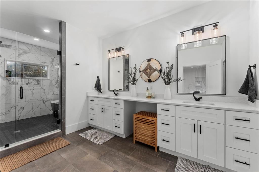 210 Locust Street Northeast Atlanta, GA 30317 - Photo 29 of 54 a spacious bathroom with double sink and a mirror