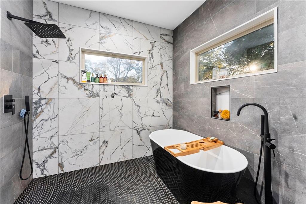 210 Locust Street Northeast Atlanta, GA 30317 - Photo 31 of 54 a bathroom with a sink and a mirror