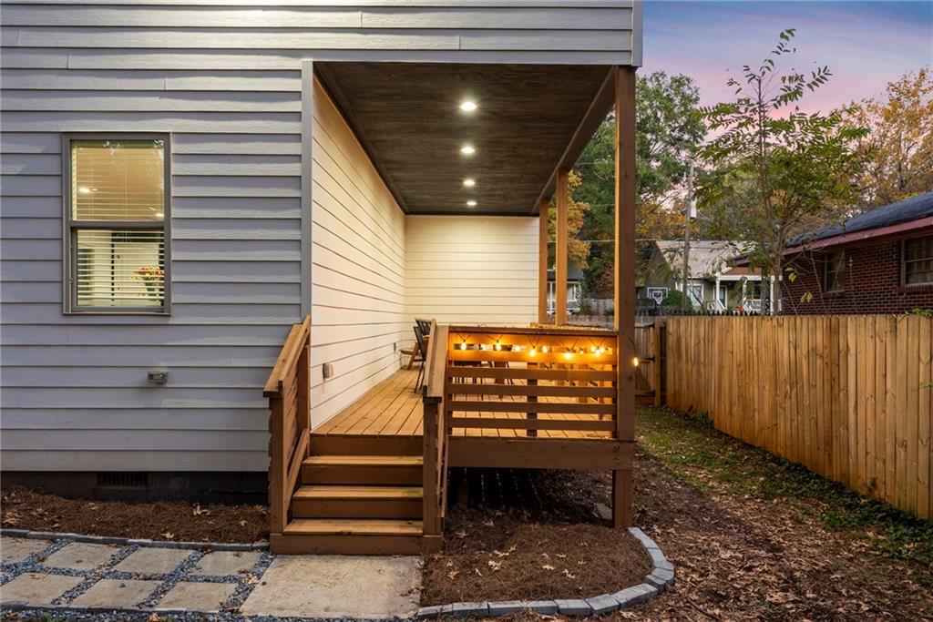 210 Locust Street Northeast Atlanta, GA 30317 - Photo 43 of 54 a view of entryway door with wooden fence