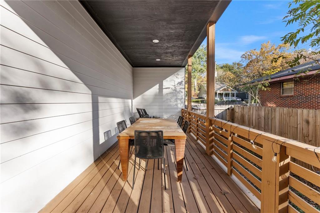 210 Locust Street Northeast Atlanta, GA 30317 - Photo 46 of 54 a balcony with wooden floor