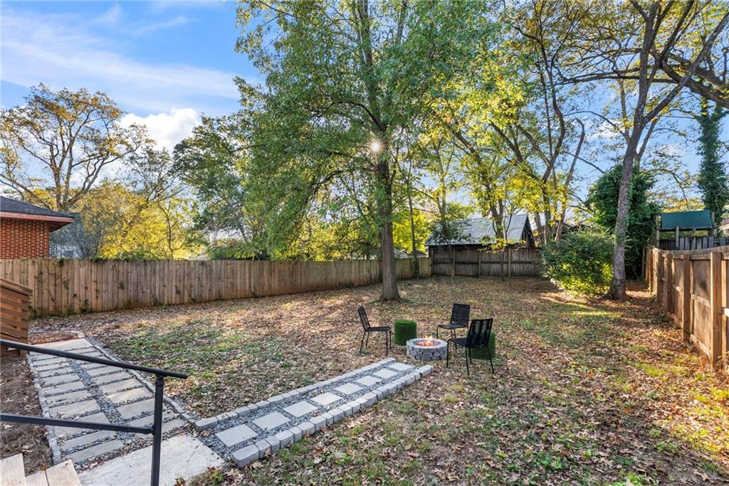 210 Locust Street Northeast Atlanta, GA 30317 - Photo 48 of 54 a view of a backyard with sitting area