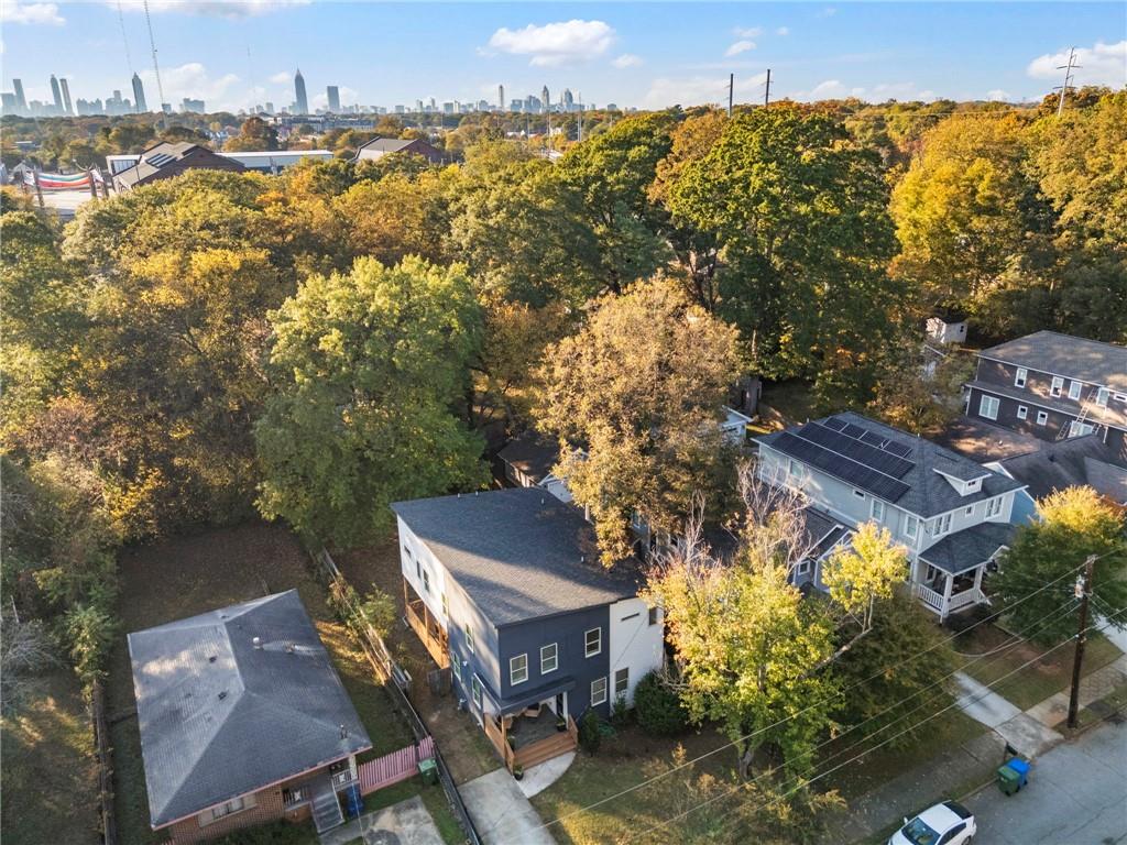 210 Locust Street Northeast Atlanta, GA 30317 - Photo 49 of 54 an aerial view of a house with a yard and lake view