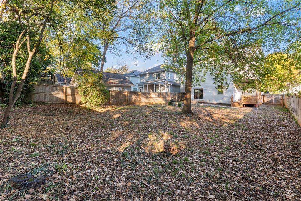 210 Locust Street Northeast Atlanta, GA 30317 - Photo 53 of 54 a view of a yard with plants and trees