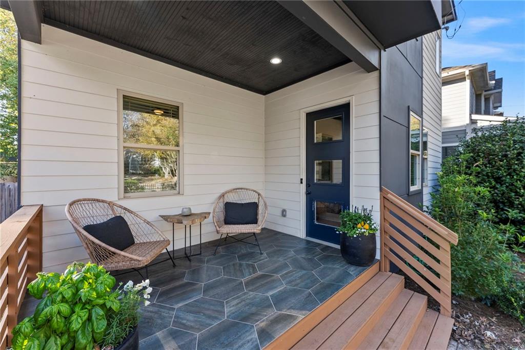 210 Locust Street Northeast Atlanta, GA 30317 - Photo 8 of 54 a lobby with furniture and potted plants