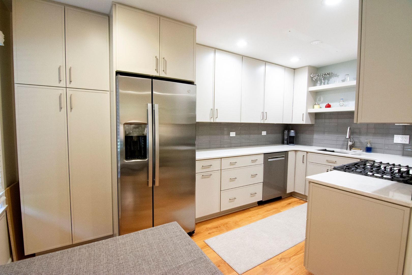 1088 Shermer Road Glenview, IL 60025 - Photo 2 of 13 a kitchen with a refrigerator sink and cabinets