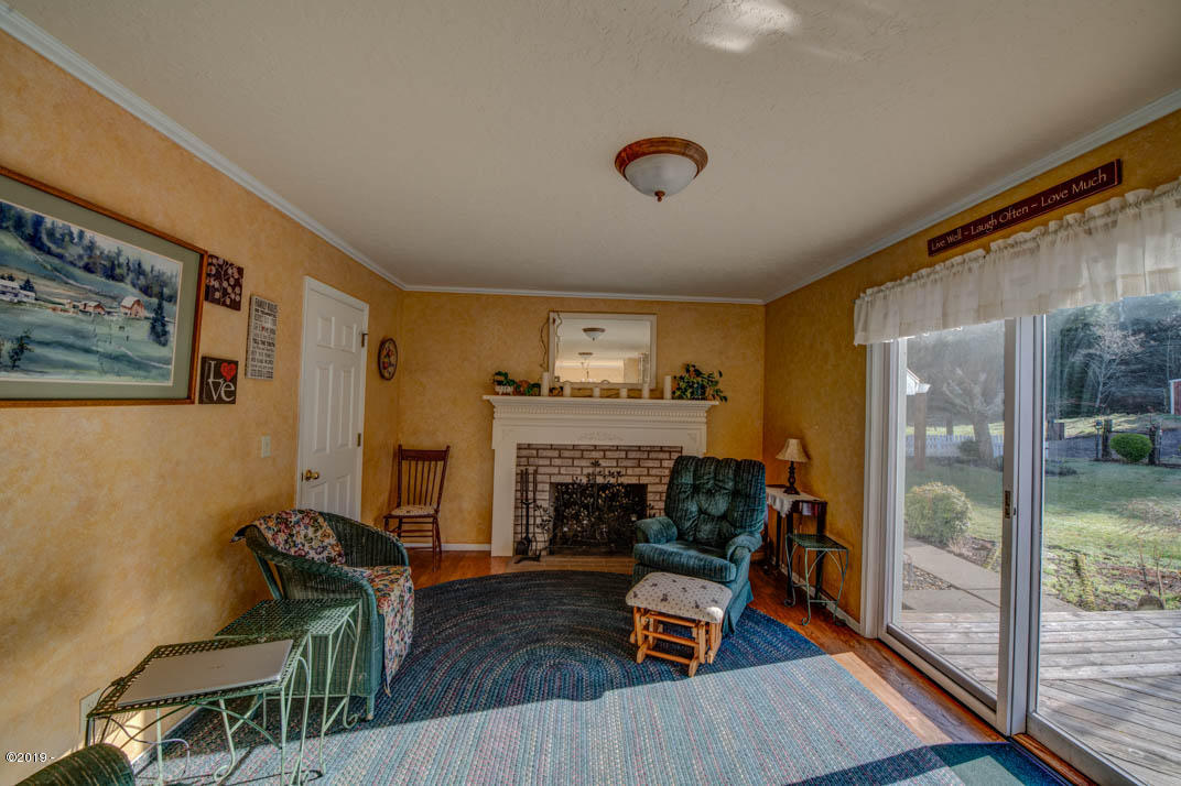 16 Fred Taylor Road Siletz, OR 97380 - Photo 15 of 34 Another living area.