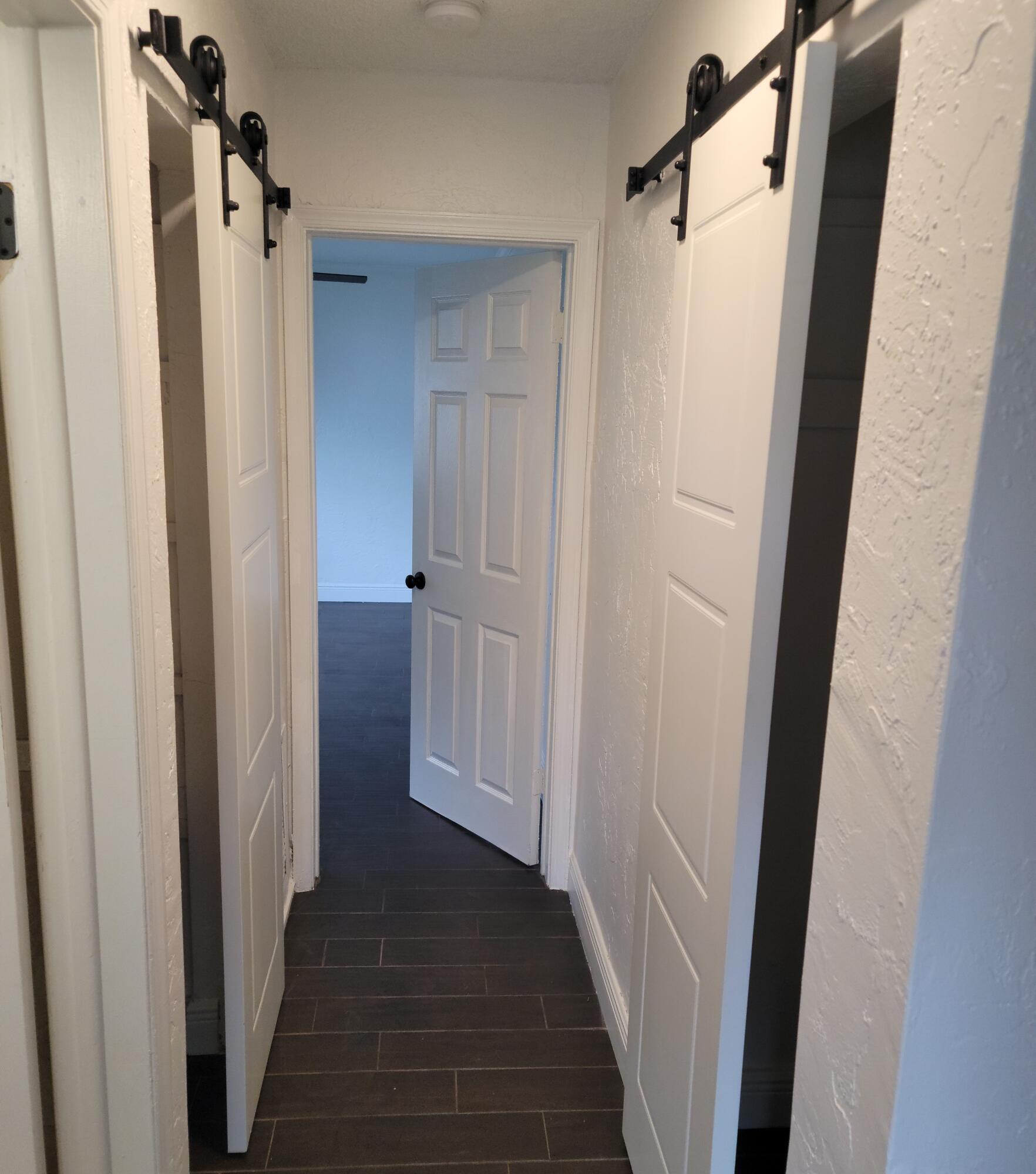 7613 Northwest 68th Terrace Tamarac, FL 33321 - Photo 4 of 13 Hallway Closets