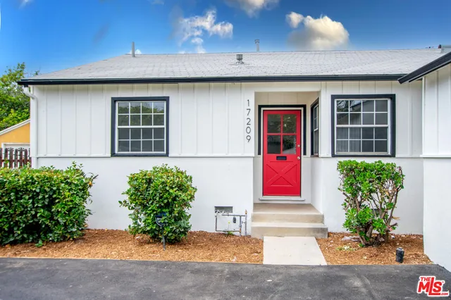 a room that has a bed and a window