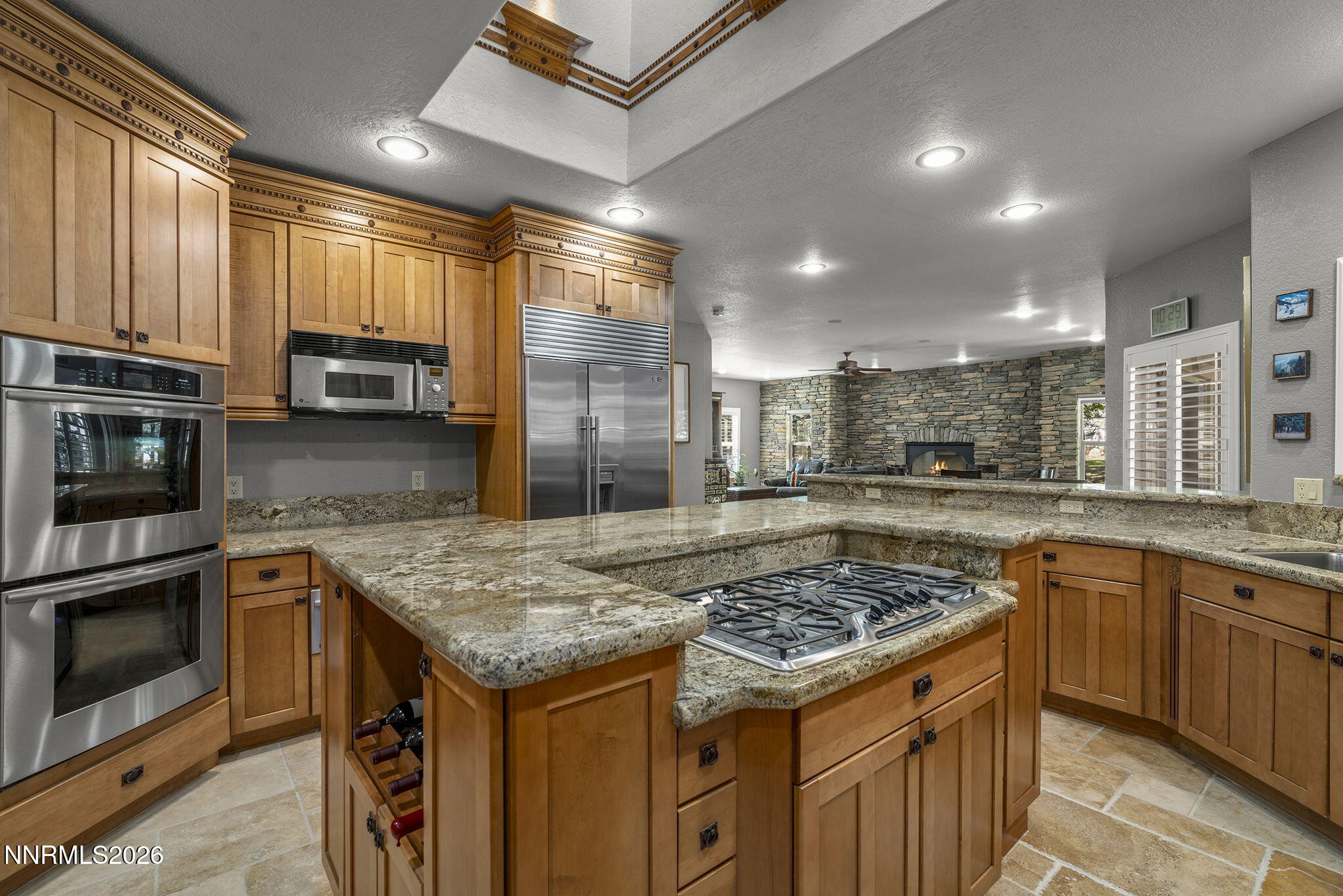 14501 Quail Rock Court Reno, NV 89511 - Photo 12 of 42 a kitchen with a stove sink and microwave