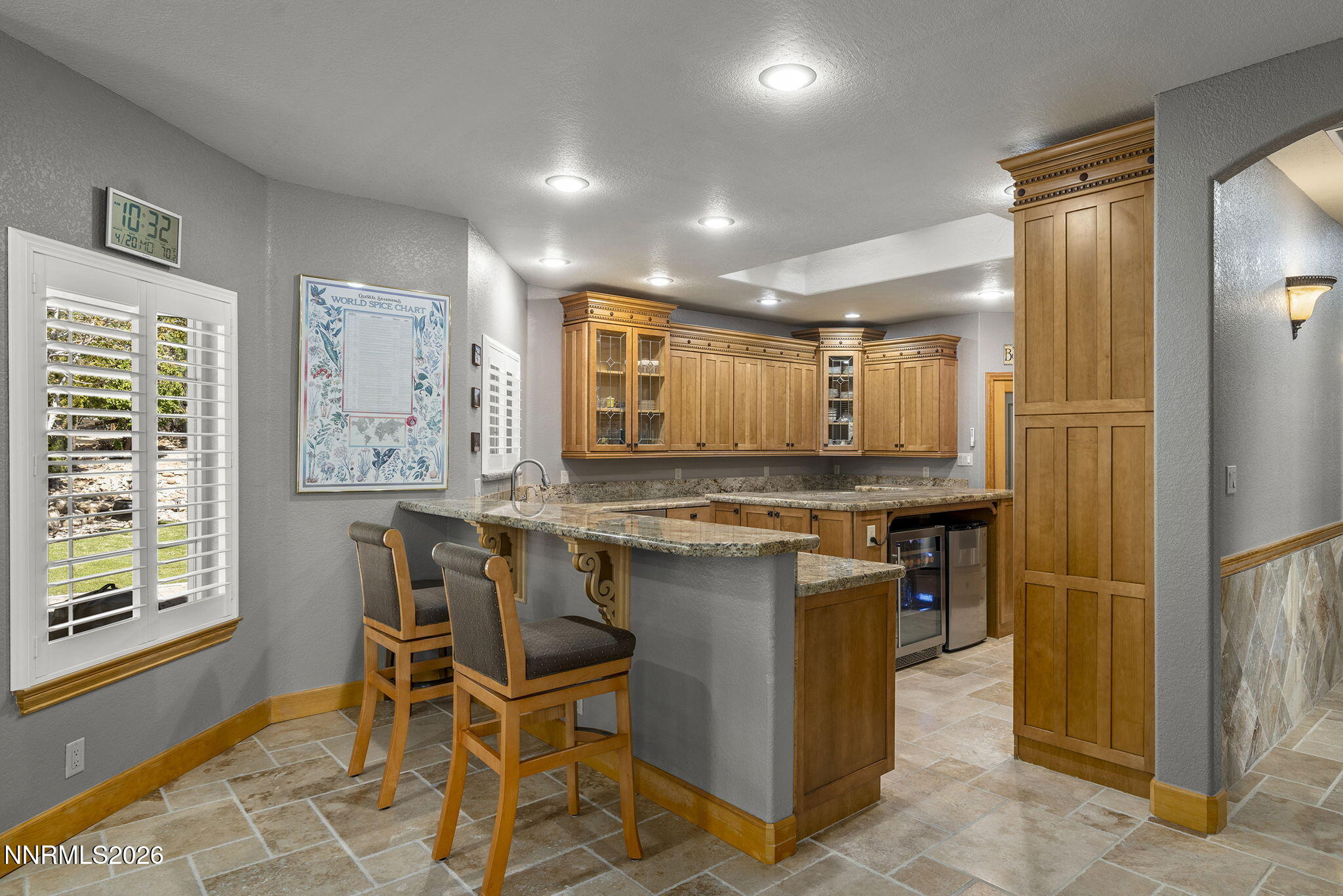 14501 Quail Rock Court Reno, NV 89511 - Photo 15 of 42 a kitchen with a table and chairs in it