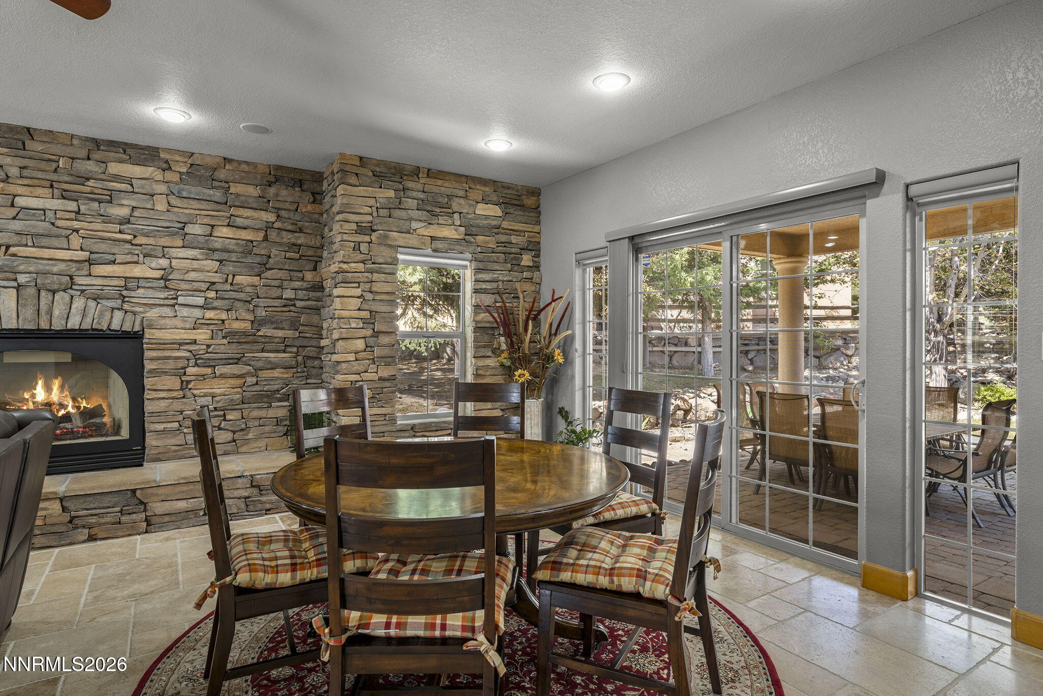 14501 Quail Rock Court Reno, NV 89511 - Photo 17 of 42 a dining room with furniture and window