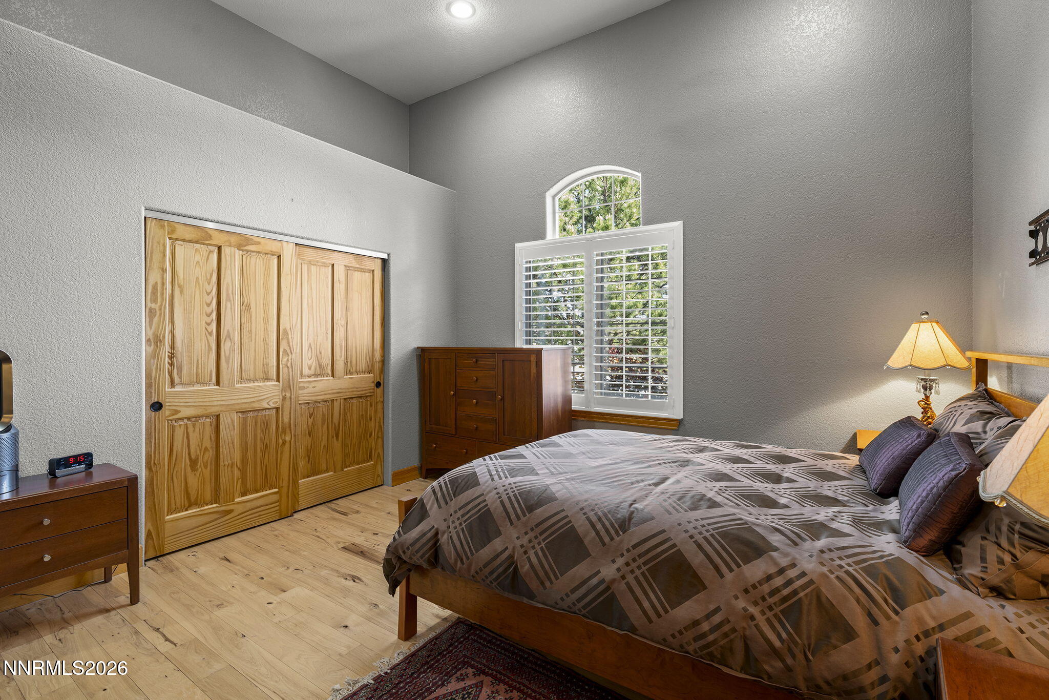 14501 Quail Rock Court Reno, NV 89511 - Photo 29 of 42 a bedroom with a bed and a window
