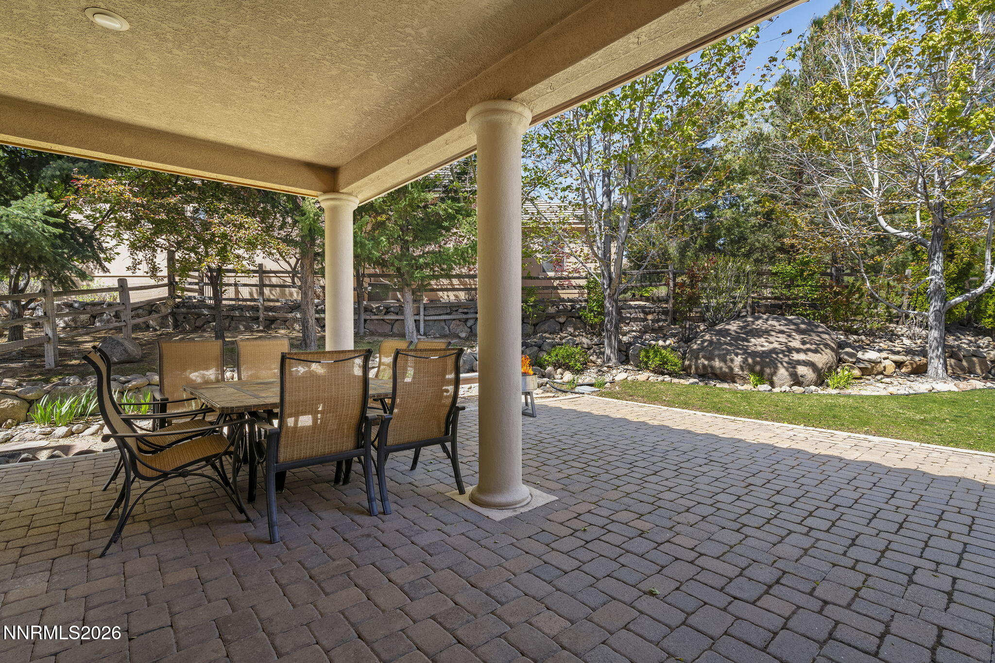 14501 Quail Rock Court Reno, NV 89511 - Photo 36 of 42 a view of a porch with chairs and backyard