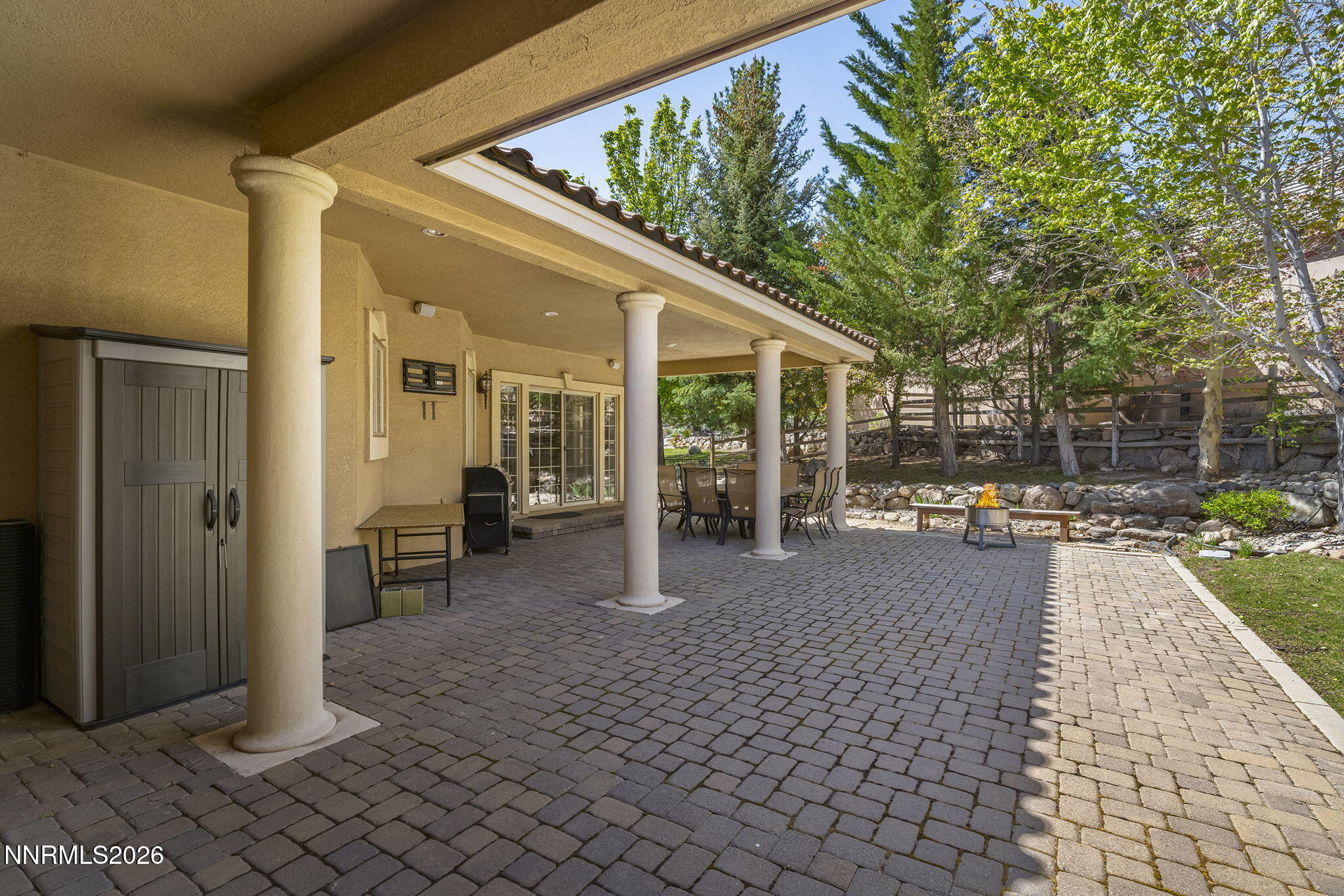 14501 Quail Rock Court Reno, NV 89511 - Photo 38 of 42 a view of a porch with chairs and backyard