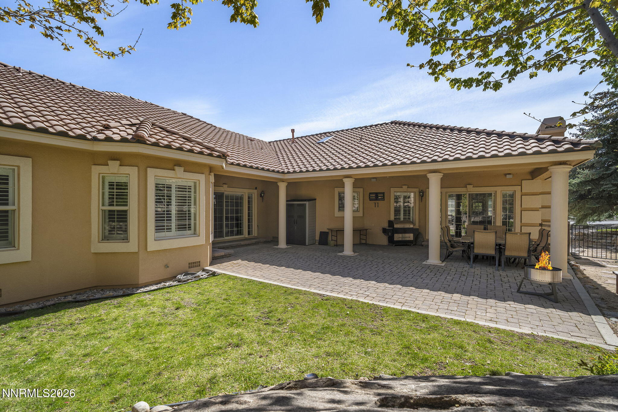 14501 Quail Rock Court Reno, NV 89511 - Photo 42 of 42 a front view of a house with a garden