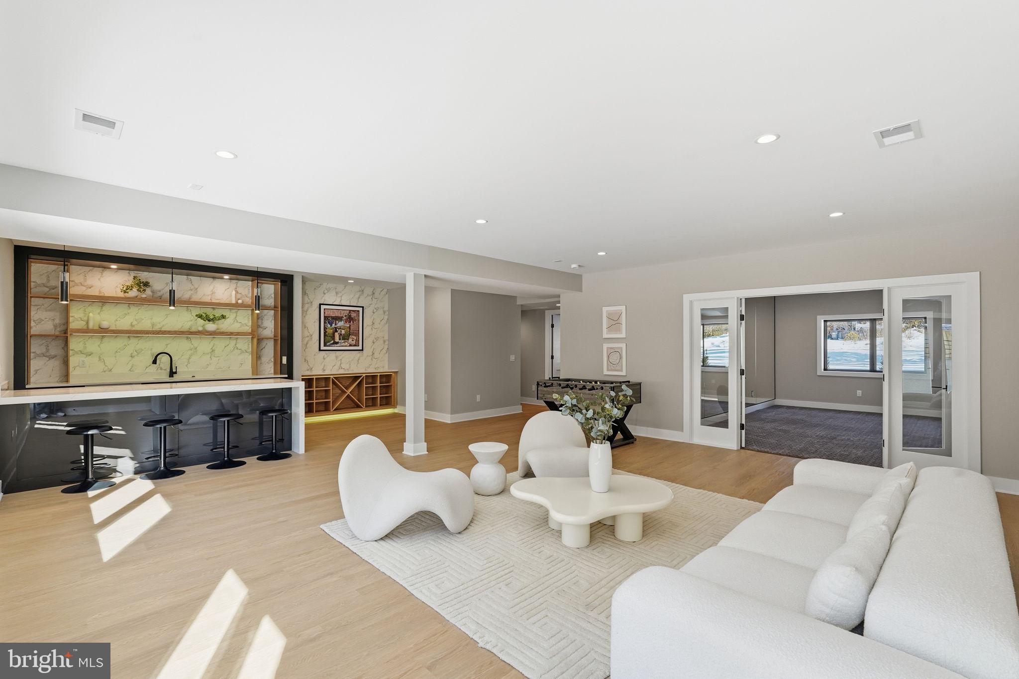 2202 Grayson Place Falls Church, VA 22043 - Photo 21 of 77 a living room with furniture and a flat screen tv