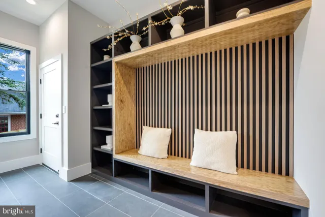 a spacious bedroom with a large bed and a couch