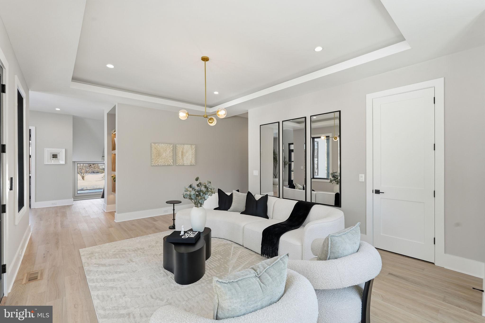 2202 Grayson Place Falls Church, VA 22043 - Photo 29 of 77 a living room with furniture and wooden floor