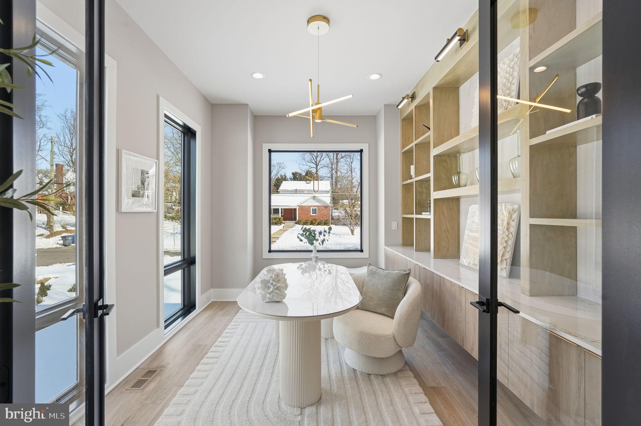 2202 Grayson Place Falls Church, VA 22043 - Photo 33 of 77 a dining room with wooden floor and large window