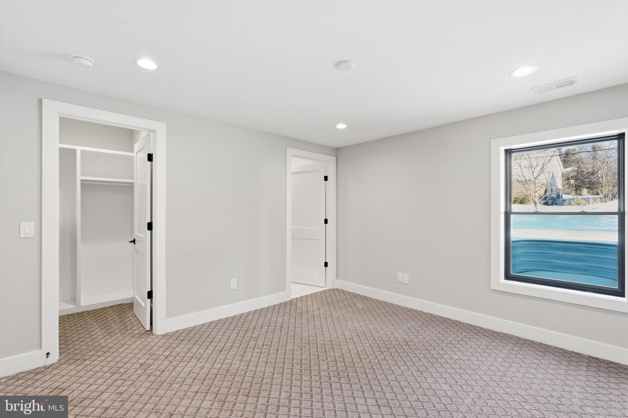 2202 Grayson Place Falls Church, VA 22043 - Photo 36 of 77 a view of an empty room with window and closet area