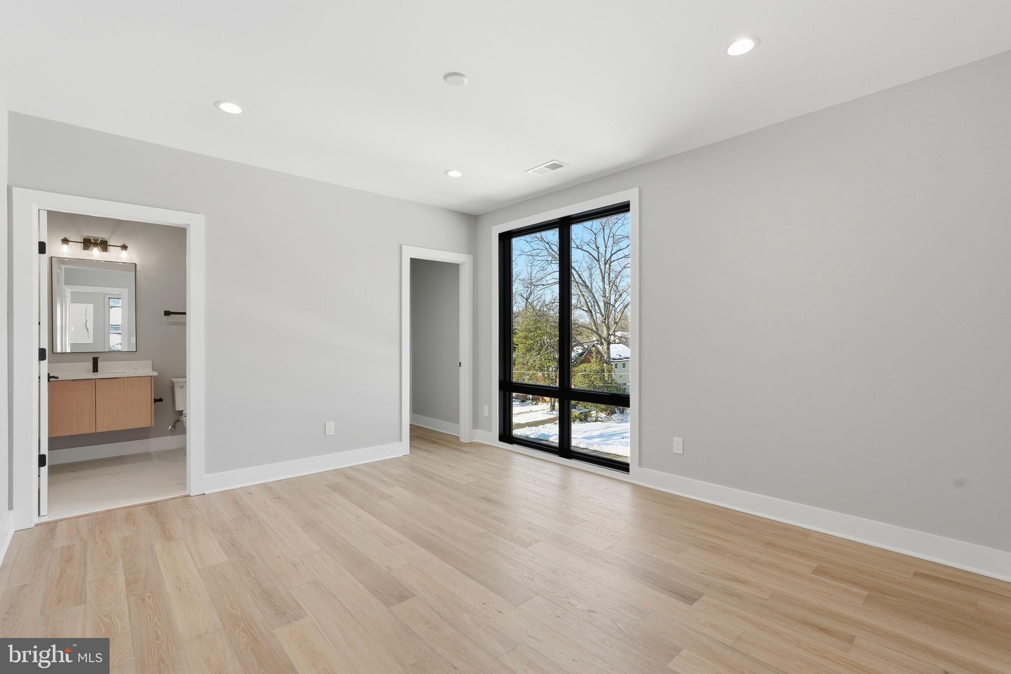 2202 Grayson Place Falls Church, VA 22043 - Photo 38 of 77 wooden floor in an empty room with a window