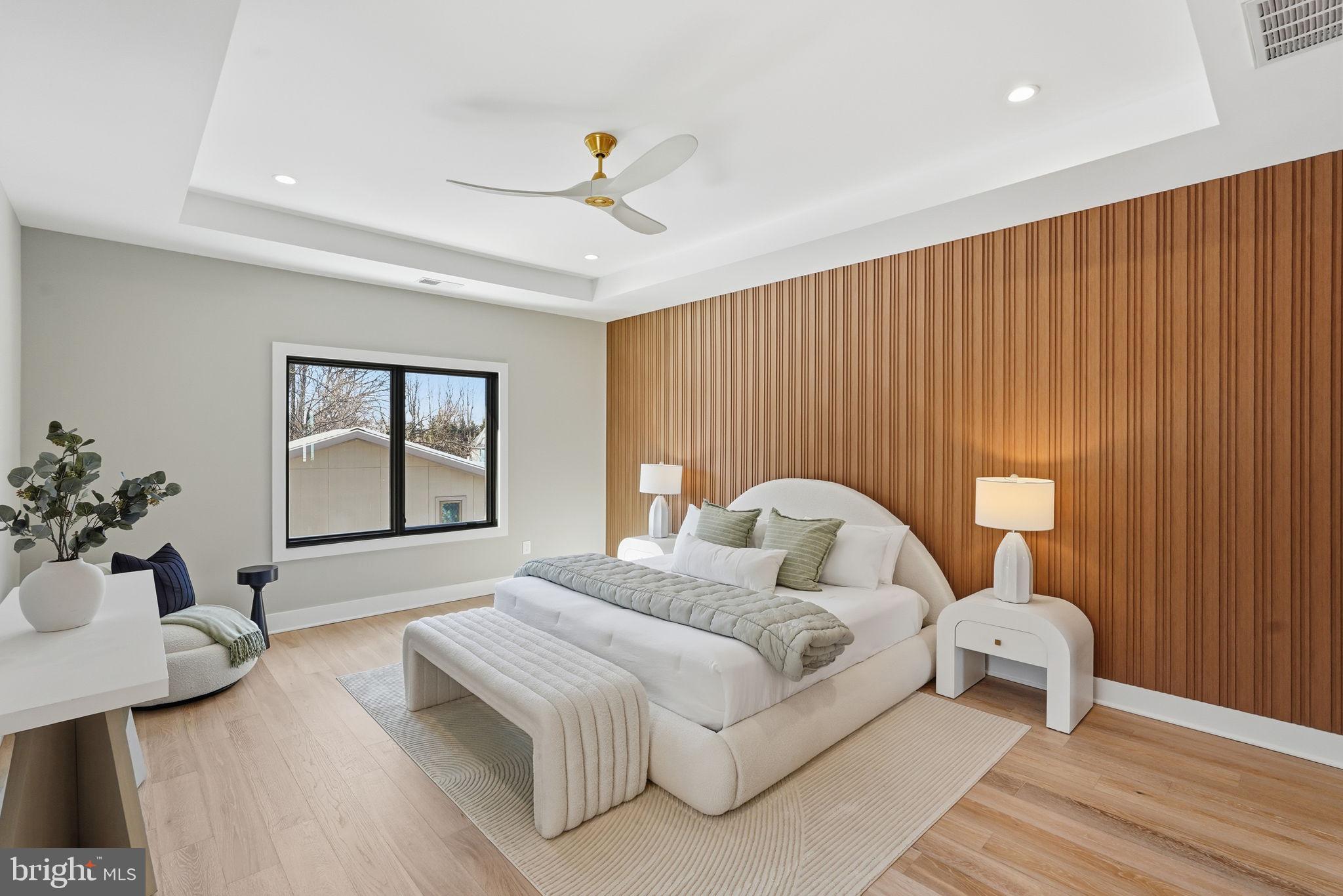 2202 Grayson Place Falls Church, VA 22043 - Photo 46 of 77 a bedroom with a bed and wooden floor