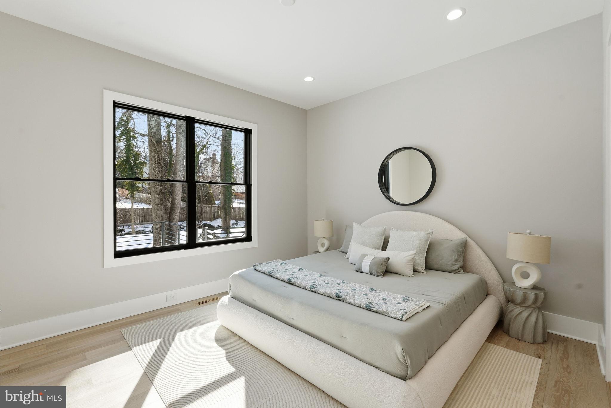 2202 Grayson Place Falls Church, VA 22043 - Photo 48 of 77 a bedroom with a large bed and a window
