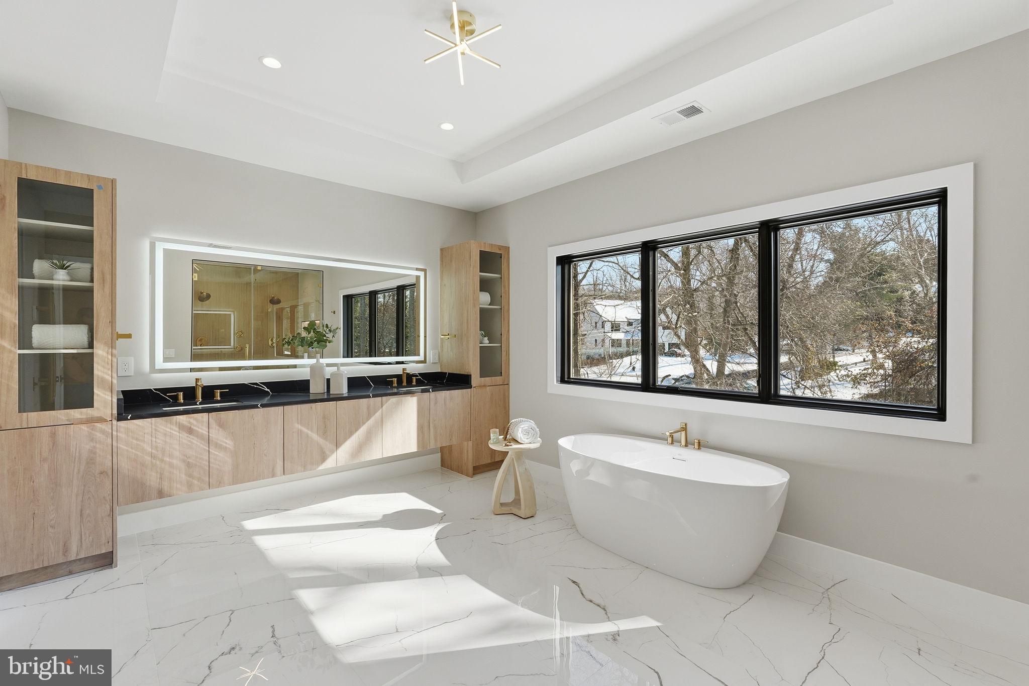 2202 Grayson Place Falls Church, VA 22043 - Photo 59 of 77 a living room with a large window and a couch