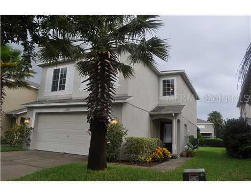 15319 Torpoint Road Winter Garden, FL 34787 - Photo 1 of 1 a front view of a house with a garden