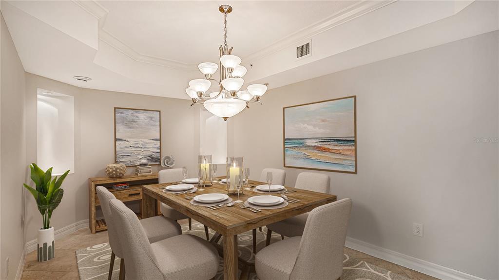 401 North Point Road, Unit 603 Osprey, FL 34229 - Photo 11 of 96 a view of a dining room with a table and chairs