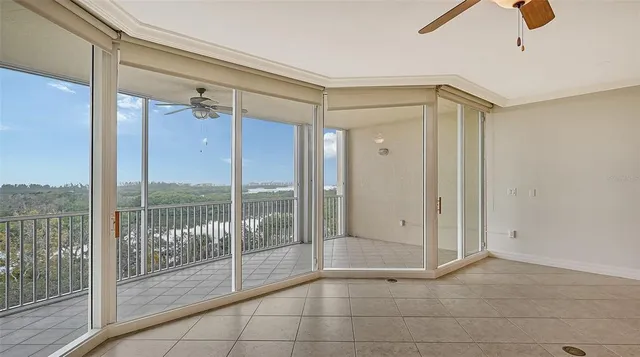 a kitchen with granite countertop wooden cabinets and a window