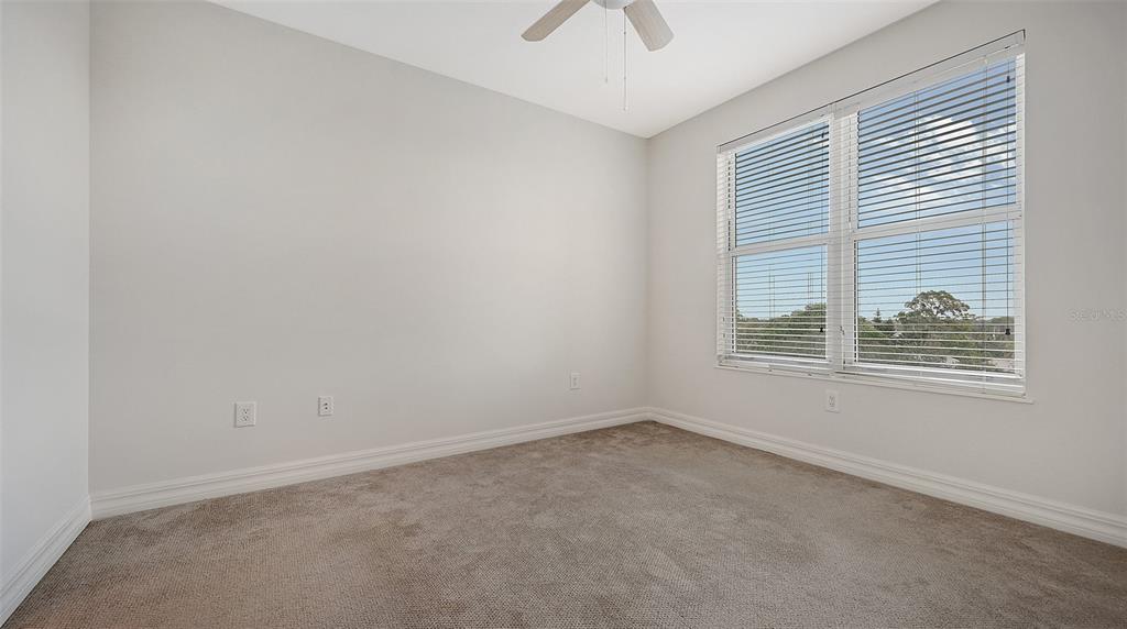 401 North Point Road, Unit 603 Osprey, FL 34229 - Photo 39 of 96 an empty room with a window