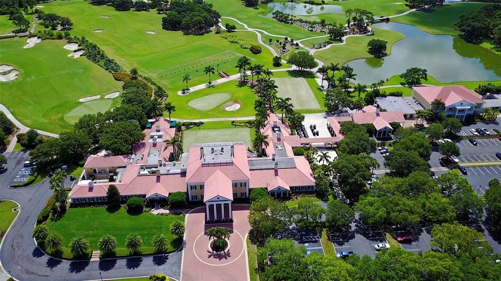 401 North Point Road, Unit 603 Osprey, FL 34229 - Photo 86 of 96 an aerial view of a house with a yard and outdoor seating