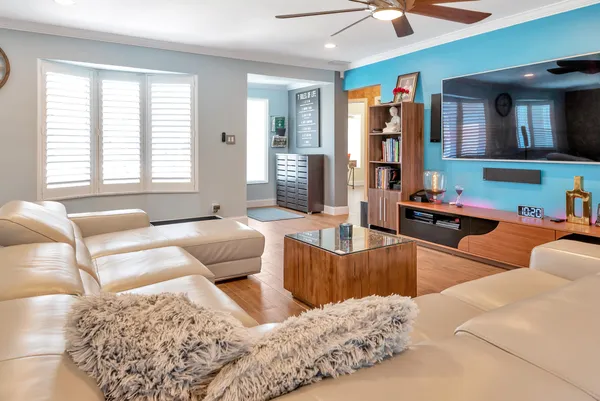 a view of a livingroom with furniture and window