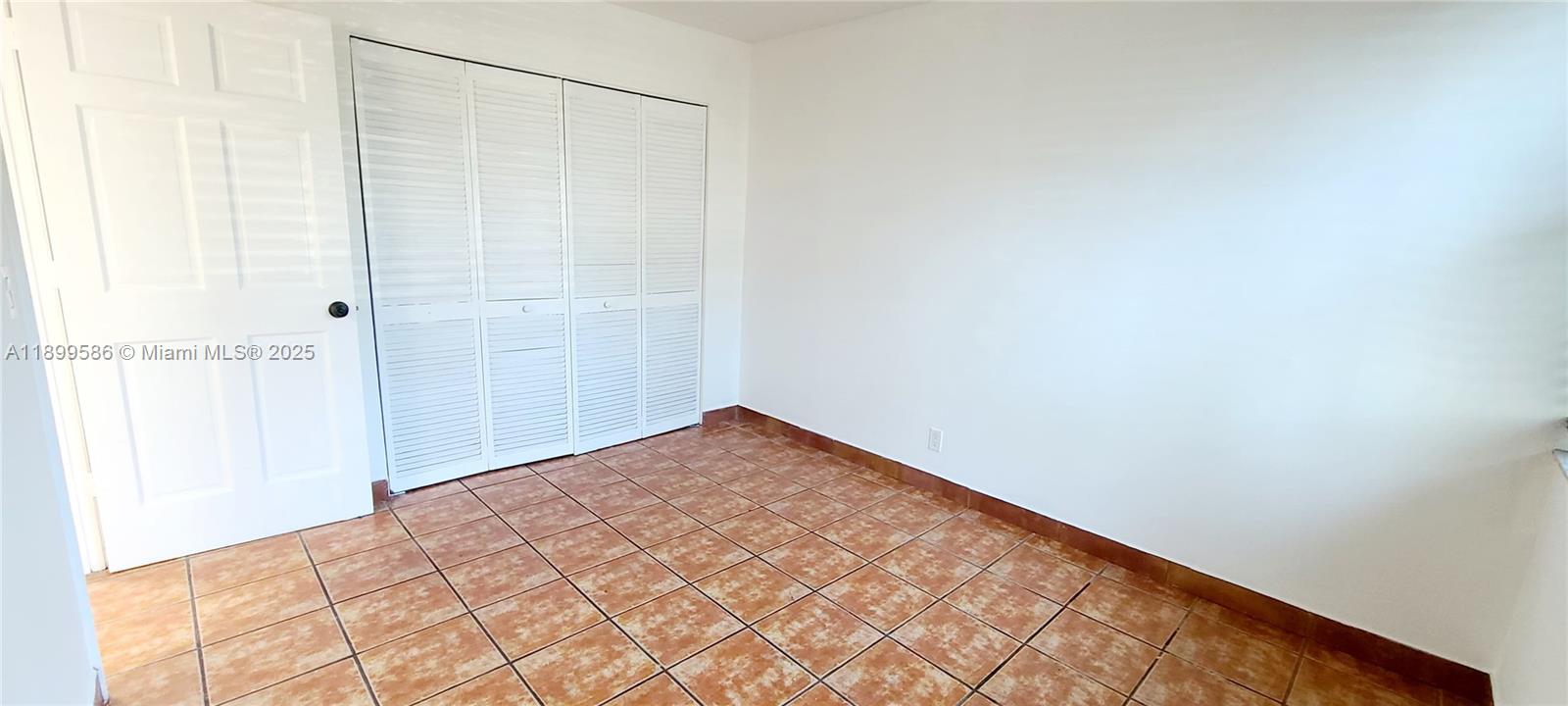 9410 Live Oak Place, Unit 109 Davie, FL 33324 - Photo 13 of 23 a view of empty room