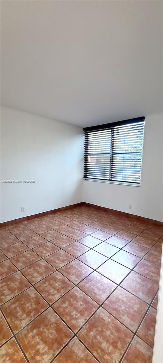 9410 Live Oak Place, Unit 109 Davie, FL 33324 - Photo 17 of 23 a view of empty room