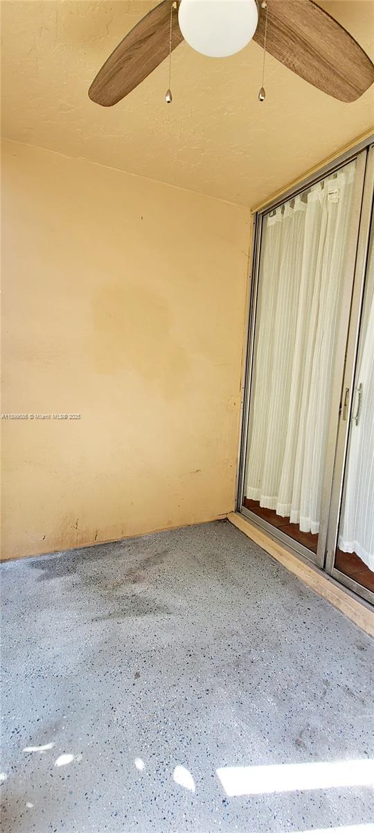 9410 Live Oak Place, Unit 109 Davie, FL 33324 - Photo 4 of 23 a view of an empty room