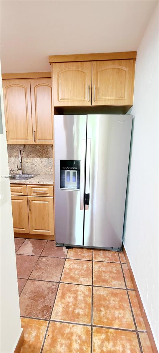 9410 Live Oak Place, Unit 109 Davie, FL 33324 - Photo 10 of 23 a view of a kitchen with a sink