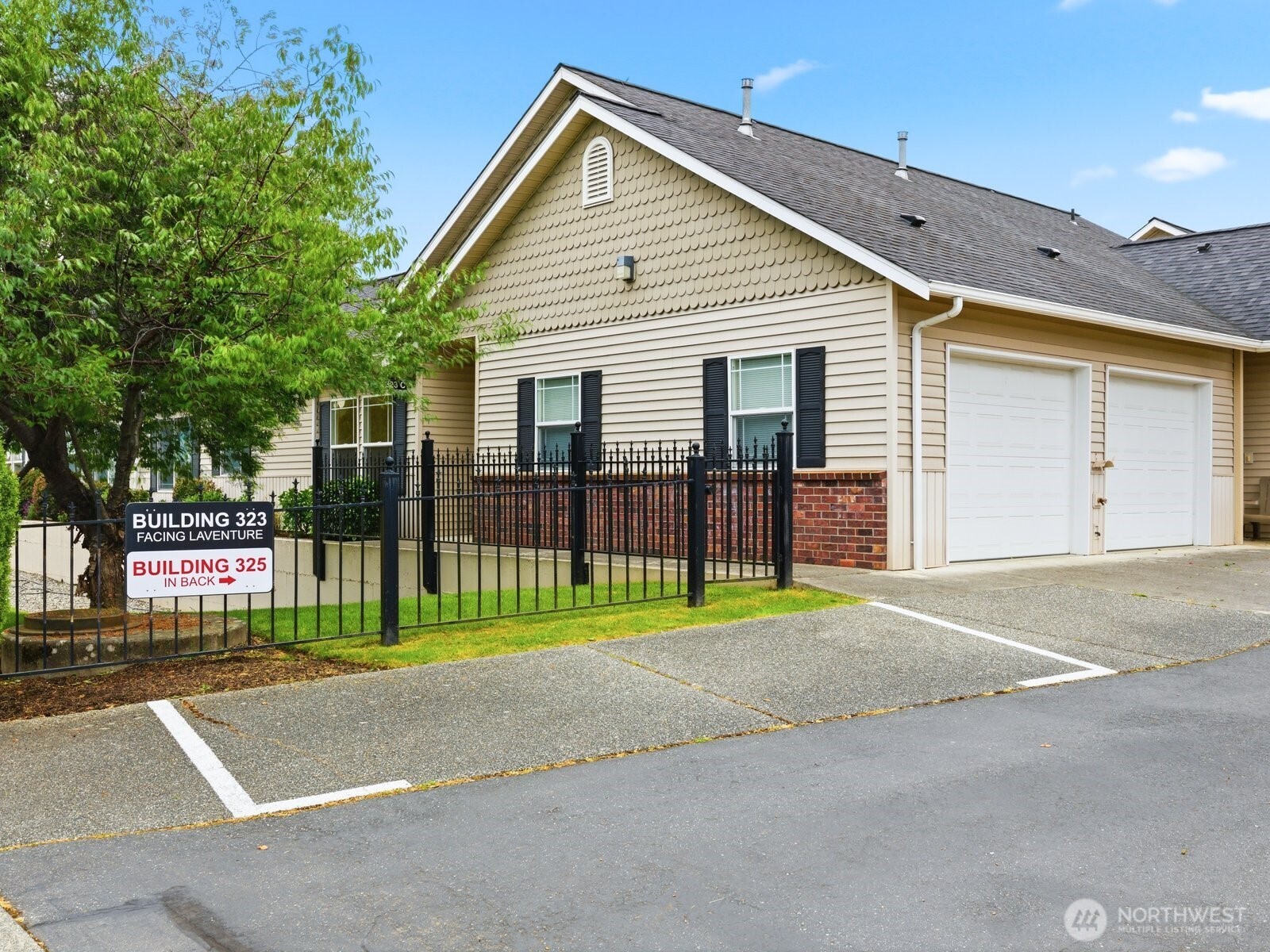 323 North Laventure Road, Unit C Mount Vernon, WA 98273 - Photo 2 of 24 a view of back yard of the house