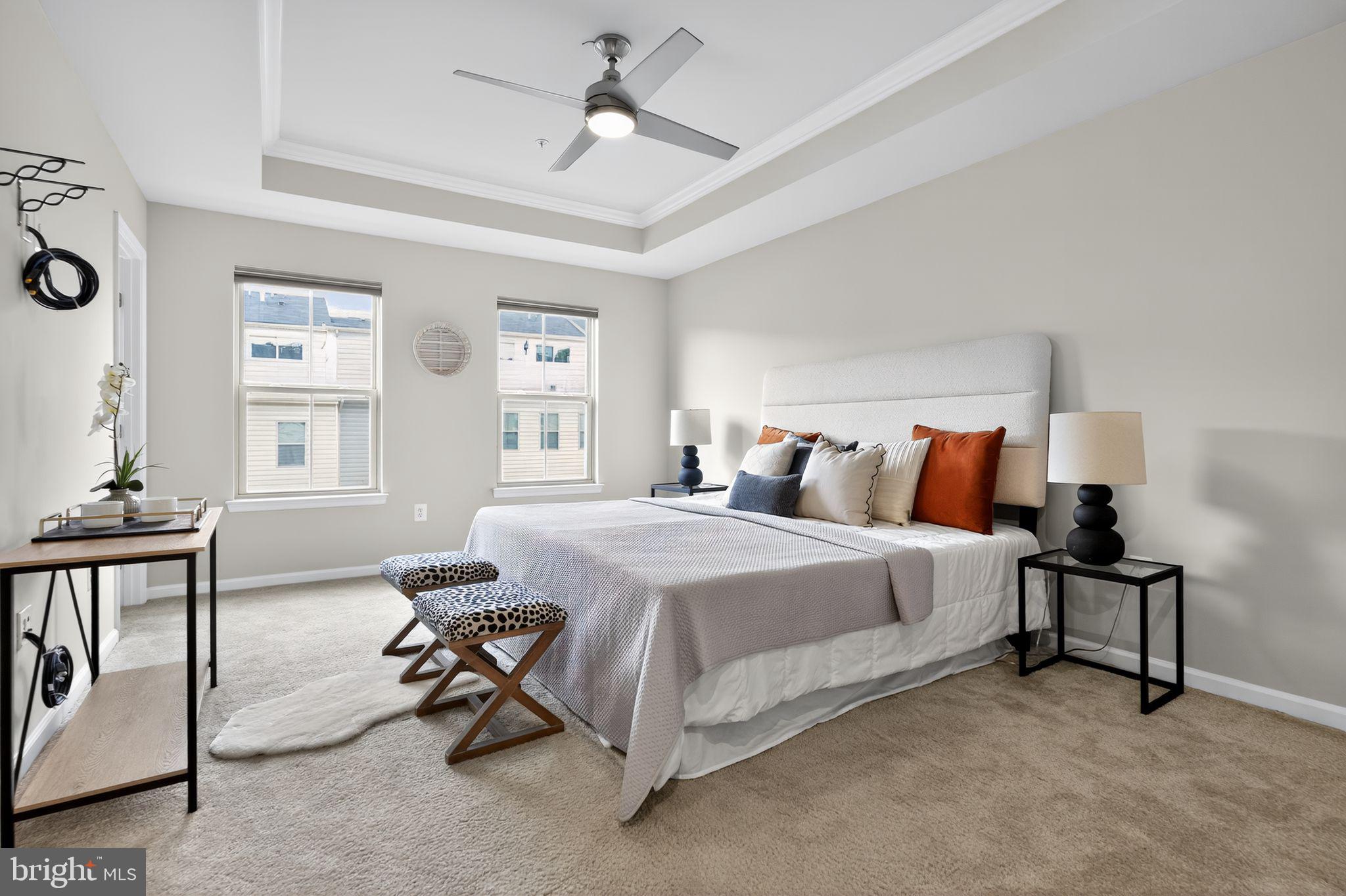 3637 Jamison Street Northeast Washington, DC 20018 - Photo 18 of 44 a bed room with a bed and a chandelier