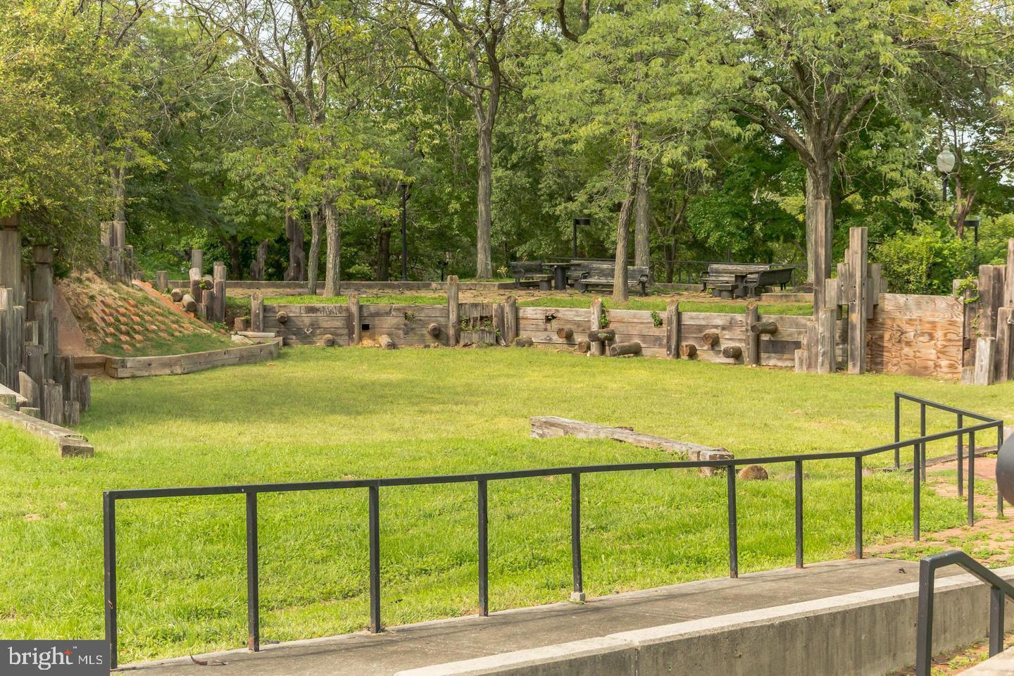 3637 Jamison Street Northeast Washington, DC 20018 - Photo 39 of 44 a view of swimming pool with lawn chairs and large trees