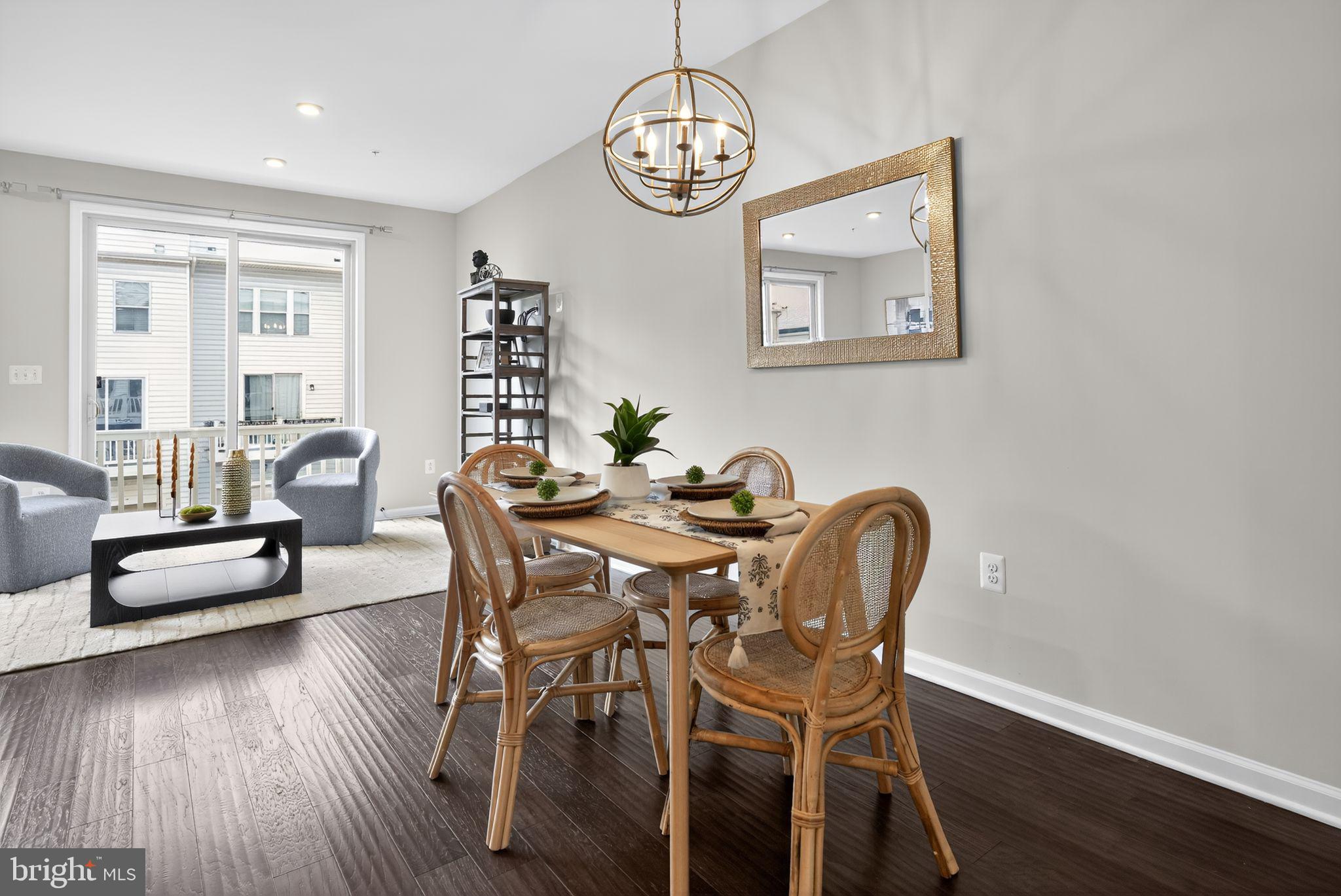 3637 Jamison Street Northeast Washington, DC 20018 - Photo 9 of 44 a view of a dining room with furniture wooden floor and a chandelier