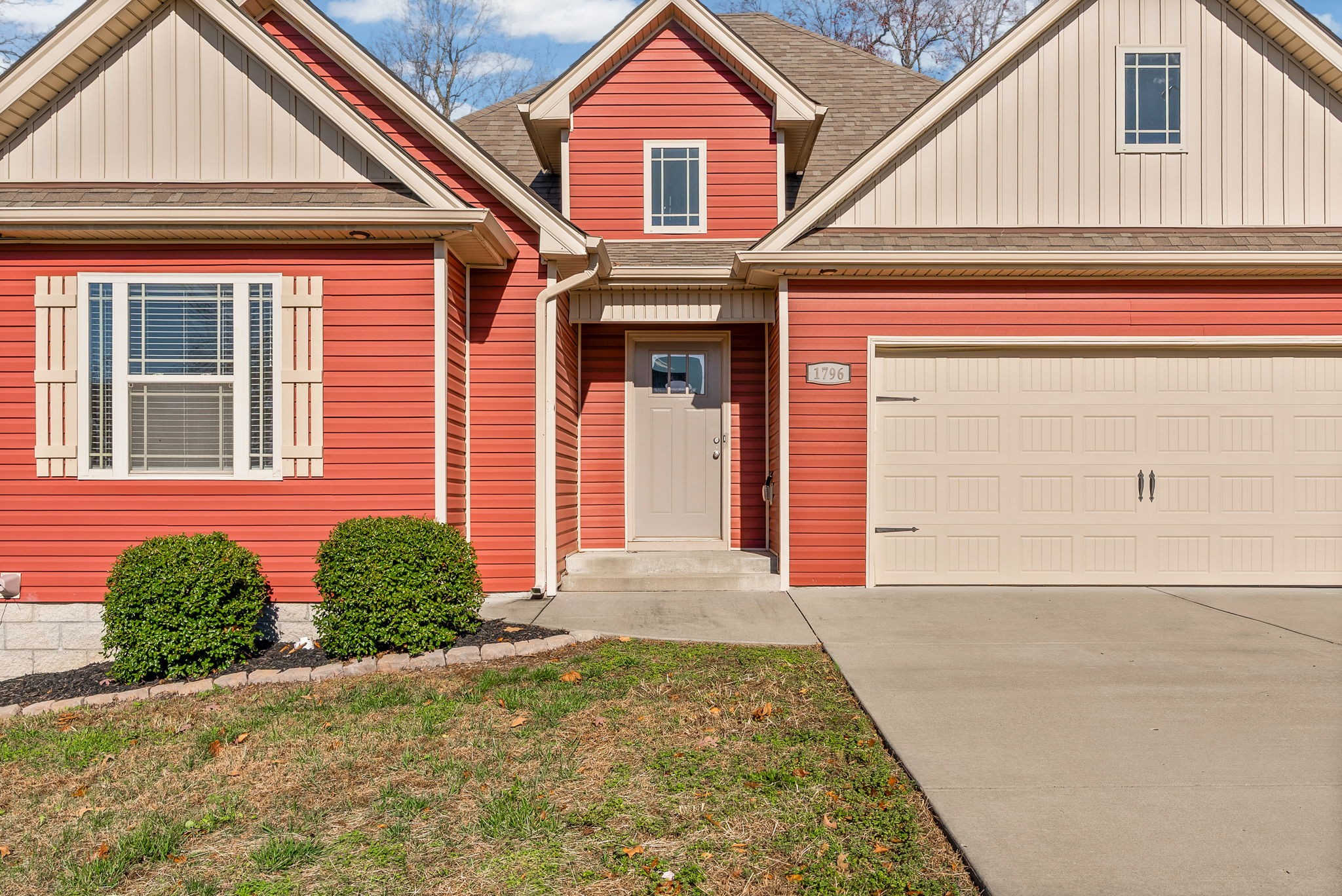 1796 Rains Road Clarksville, TN 37042 - Photo 3 of 26 a front view of a house with a yard and garage