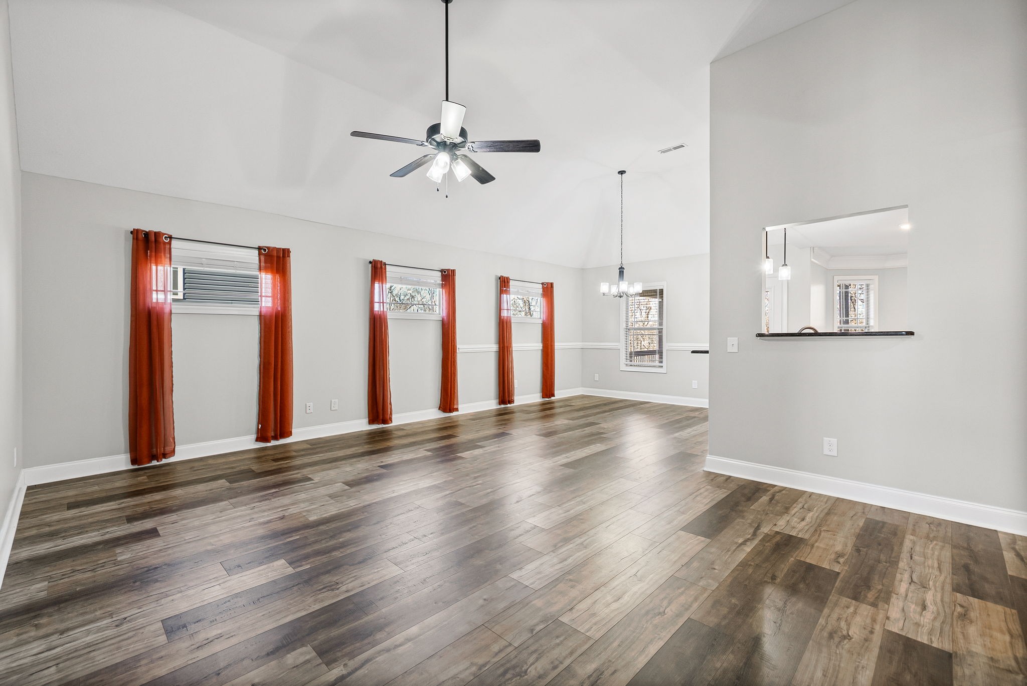 1796 Rains Road Clarksville, TN 37042 - Photo 4 of 26 a view of an empty room with window and wooden floor