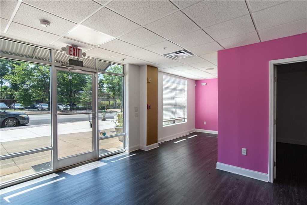 5300 Peachtree Road, Unit 1308 Atlanta, GA 30341 - Photo 5 of 16 a view of livingroom with furniture wooden floor and window