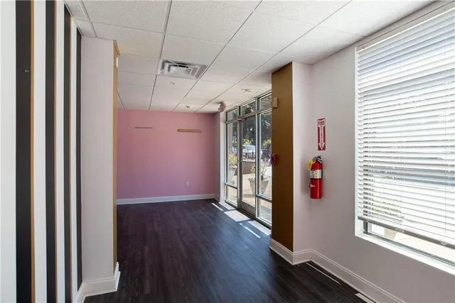 a view of entryway with wooden floor