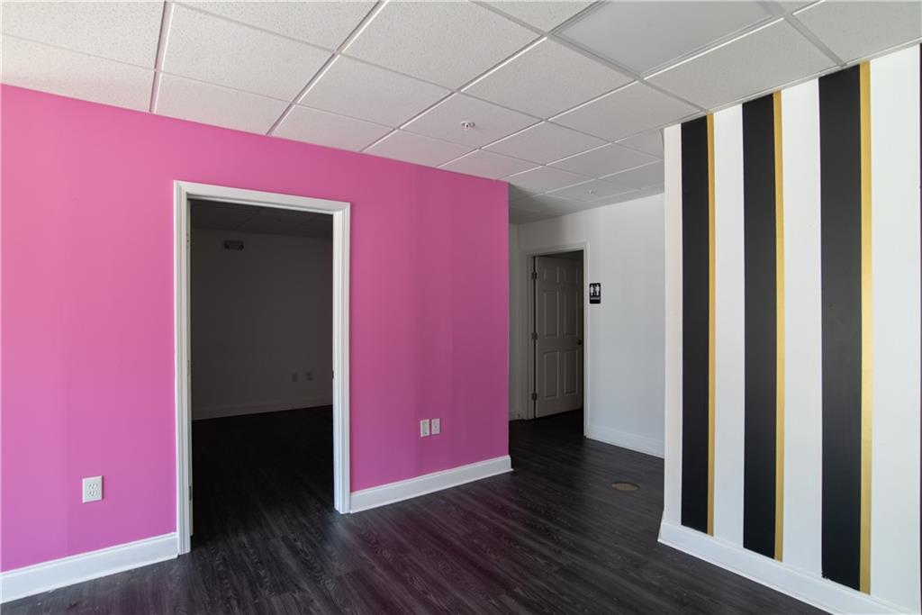 5300 Peachtree Road, Unit 1308 Atlanta, GA 30341 - Photo 8 of 16 a view of a livingroom with wooden floor