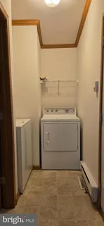 a utility room with a washer and dryer