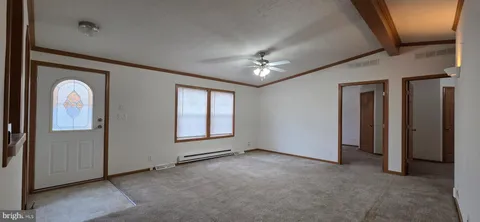 an empty room with windows