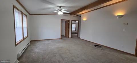 a view of a hallway with a chandelier